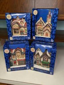 lot 233 image: Set of (4) New Victoria Falls Winter Village Porcelain Houses
