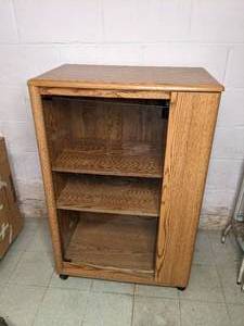 lot 218 image: Wood and Glass Cabinet with Side Storage