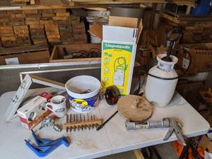 lot 135 image: Weed Sprayer, Drill Bits, Caulk Gun, and More
