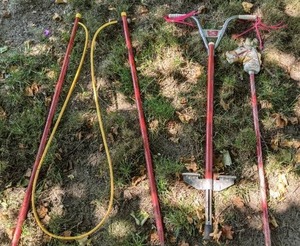 lot 820 image: Awesome Lot of Vintage Toys Pogo Stick, Broom Tail Horse, Diabolo Sticks