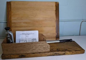 lot 864 image: Kenkel, Inc. Hardshell Nutcracker & Wooden Cutting Board