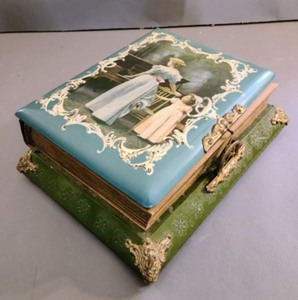 lot 432 image: Victorian Celluloid Photo Album on Music Box Stand