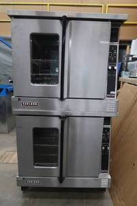 lot 4 image: 2 STACKED GARLAND CONVECTION OVENS.