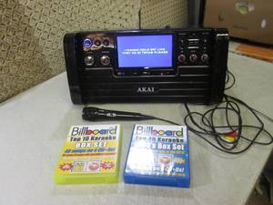 lot 39 image: (RM4) Akai Karaoke Machine with 2 B...