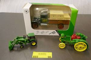 lot 96 image: John Deere toys - truck bank with boxes In the back, loader and a Waterloo boy