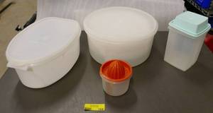 lot 104 image: Tupperware - pie storagedelivery, turkey leftover storage, pickle jar and juicer