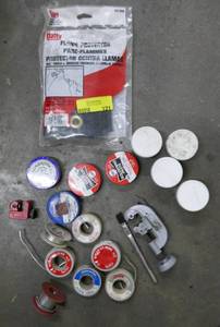lot 121 image: Plumbers soldering supplies - pipe cutters, solder and paste