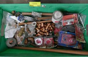 lot 122 image: Tote with copper fittings, metal strap, pipe cleaner,  thread seal tape, etc