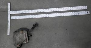 lot 160 image: Two 4 ft aluminum dry wall T-Square and ruler with a leather tool pouch