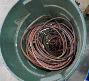 lot 172 image: Barrel full of various size air hoses