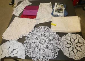 lot 198 image: Lot of new table covers, runners, and vintage doilies