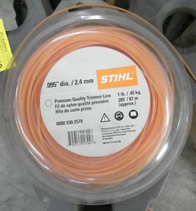 lot 218 image: Stihl .095 diameter string for weed whip, Not sure if any string was used out of this reel