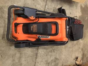 lot 38 image: Black and Decker Lawmower electric see pictures open box