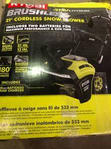 lot 32 image: RYOBI 40V Brushless 21 in. Cordless Electric Snow Blower with (2) 5.0 Ah Batteries and Charger in good conditions
