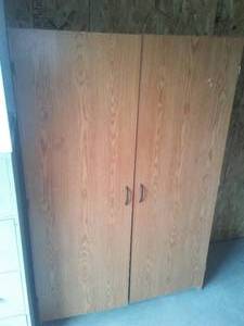 lot 16 image: Wood Cabinet with Doors.