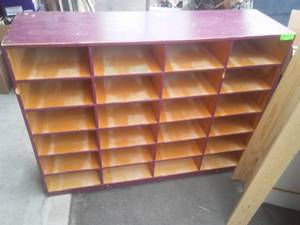 lot 31 image: Roller Cart Bookcase  Cubby Holes. 24 shoe cubbies.