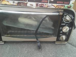 lot 43 image: Toaster Oven  Crock Pot  Donut Bakery