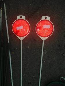 lot 73 image: Gardening Plastic Stakes and reflectors