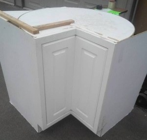 lot 76 image: Lazy Susan Corner Cabinet. Base White Door