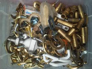 lot 103 image: Hardware, brass plumbing, handle knobs and more.