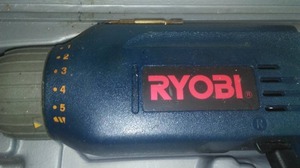 lot 138 image: Ryobi Drill and 12 V Battery in case.