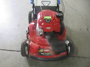 lot 14 image: Toro 22 in. Recycler SmartStow High Wheel Variable Speed Walk Behind Gas Self Propelled Mower 20339