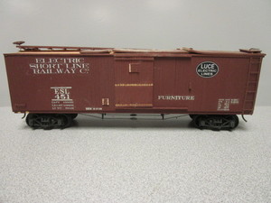 lot 173 image: O-SCALE LUCE ELECTRIC LINE WOOD-SIDED FURNITURE BOXCAR