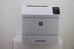 lot 24 image: HP Laser Jet Enterprise M604 Printer