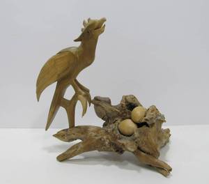 lot 31 image: Carved Wood Bird on Nest Sculpture