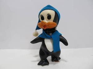 lot 108 image: Vintage CHILLY WILLY Penguin Coin Bank