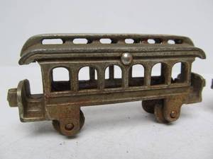lot 186 image: Original Antique Cast Iron Toy Trolley Cars