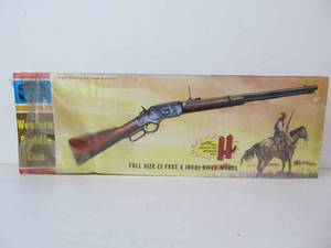 lot 142 image: Vintage Life-Like Western Saddle Gun