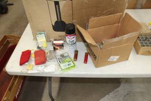 lot 457 image: Gun Accessories  with Gun Lock, Gun Scrubber, Magazine Cap Super Swivels, Hand Warmers, Plastinook 932