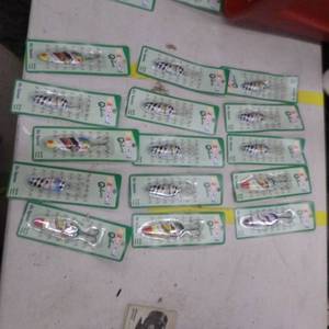 lot 297 image: Lot of (15) Fishing Lures NASCAR Themed (in original packaging)