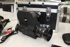 lot 28 image: Canon Scoopic 16M Camera  with Accessories and Road Case