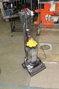 lot 40 image: Dyson DC33 Canister Vacuum
