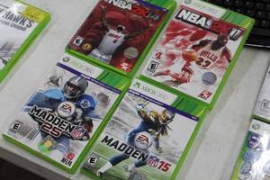 lot 127 image: Lot of (4) Xbox 360 Video Games  - Madden 15, Madden 25, NBA2011, NBA2K14