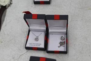 lot 143 image: Lot of (2) Star Pendant Womens Necklaces 110CT TW Diamond Sterling Silver  - Cases
