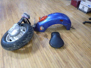 lot 6 image: Honda Motorcycle Wheel, Fender and Seat