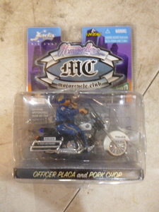 lot 80 image: Jada Toys Homie Rollerz Officer Placa and Pork Chop