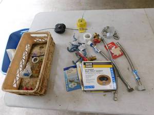 Miscellaneous Plumbing Repair Items In A Basket