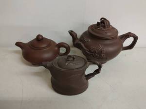 Three Asian-Style Teapots