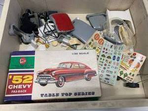 lot 39 image: Vintage Model Car Parts & Stickers