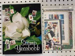 lot 51 image: New Unopened 2004 Stamp Yearbook with Stamps (Sold $70 Ebay)