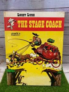 lot 83 image: The Stage Coach Lucky Luke Hardback Book RARE