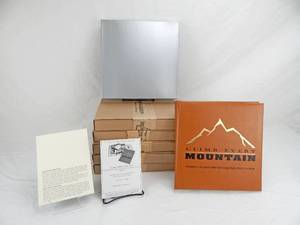 lot 11 image: Lot of 6 Limited Edition Climb Every Mountain Leather Bound Books