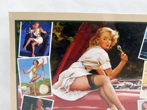 lot 46 image: Cobble Hill Gil Elvgren Roadside Attractions Pin Up 1000 Piece Sealed Puzzle