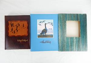 lot 8 image: Set of 1948 and 1971 Vintage Limited Edition Richard Bishop Leather Bound Books