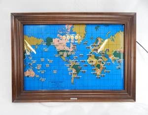 lot 10 image: Vintage 1959 Howard Miller Barwick World Time Map Clock