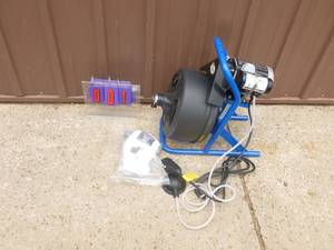 Cobra 100 power sewer snake with accesroies. Unused. Motor wasnt attached to mounting bracket & is now held on with a hose clamp. Motor works forward & reverse. As shown.